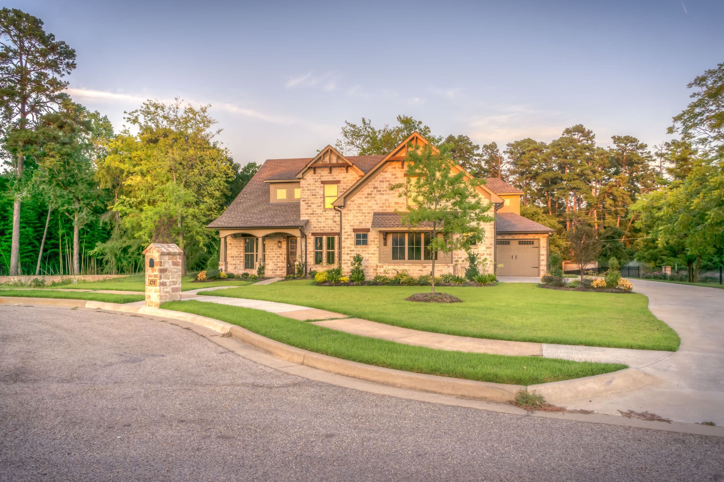 Striped, freshly cut estate lawn with crisp edges